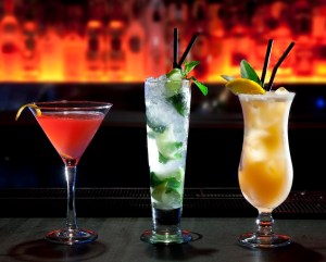 Three cocktails on the bar